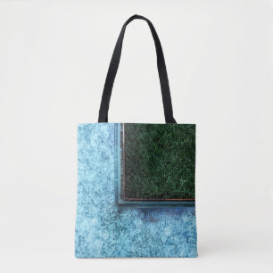 Photo of green grasses near tiles tote bag