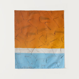 Photo of orange, white, and blue artwork tapestry