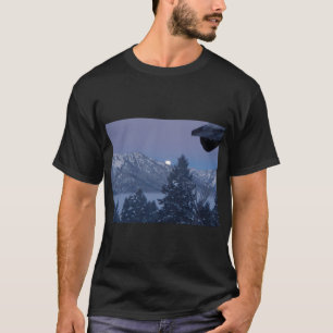 photo of the moon setting behind mountains T-Shirt
