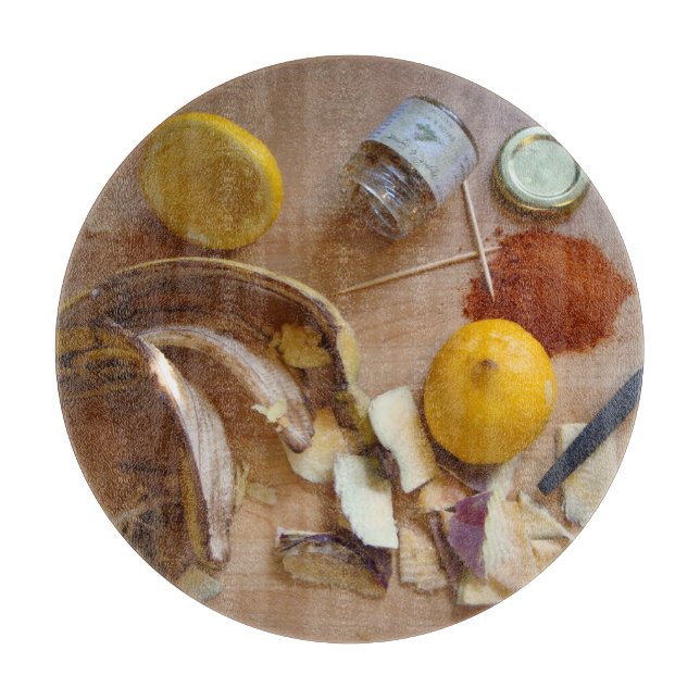 photo of untidy kitchen vegetable skins fun cutting board (Front)