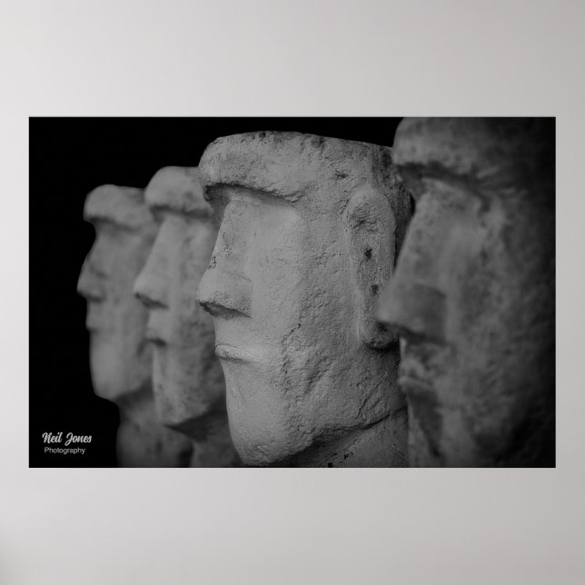 Photograph of four stone heads poster. poster (Front)