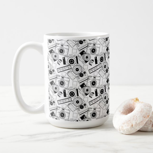 Photography cameras in black and white coffee mug (With Donut)