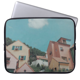 PHOTOGRAPHY OF CONCRETE HOUSES LAPTOP SLEEVE