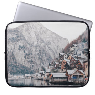 PHOTOGRAPHY OF HOUSE BESIDE BODY OF WATER LAPTOP SLEEVE