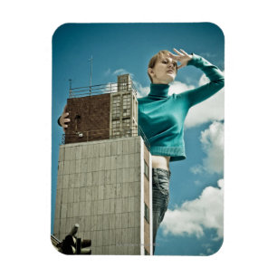 photomontage of young girl on city shot magnet