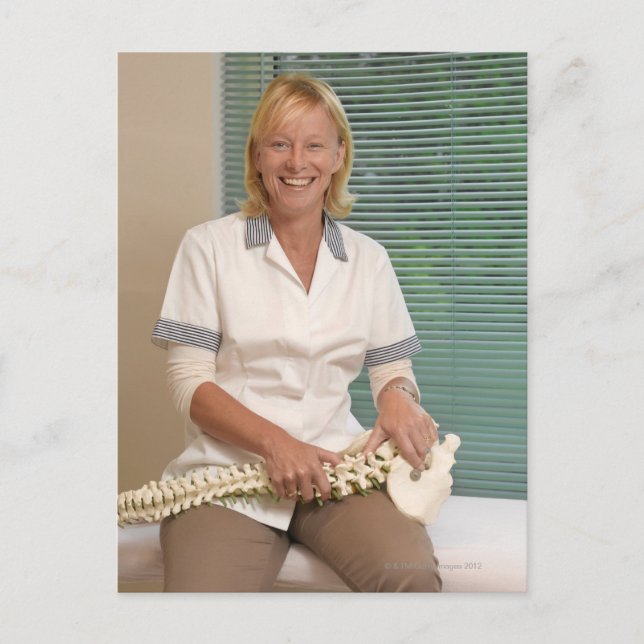 Physiotherapist with model of spine postcard (Front)