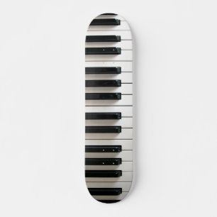 piano keyboard black and white skateboard