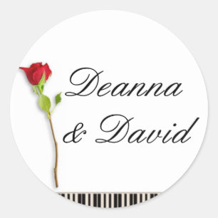 Piano keys and a rose classic round sticker