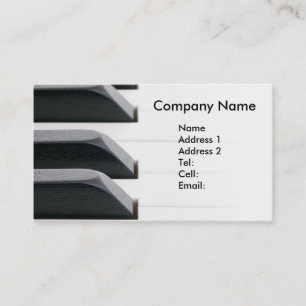 Piano keys fading to bright white business card