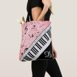 Piano Music Script Monogram Rose Gold Glitter Tote Bag<br><div class="desc">Chic piano keyboard and music notes in black and white with a rose gold glitter background personalised with your monogram and customised with your saying, title or other text. CHANGES: You can change the text font style, colour, size and placement by clicking on CUSTOMIZE FURTHER for a custom look or...</div>