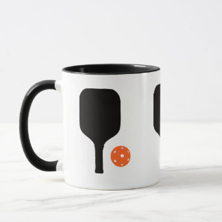 Pickleball paddle & orange pickleball mug