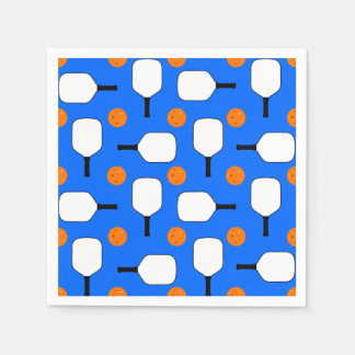 Pickleball Paddles, Orange Pickleball Balls, Blue Napkin
