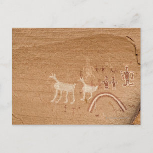 Pictographs on sandstone canyon walls in Canyon Postcard