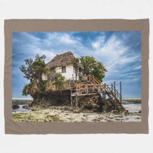 Picturesque house on a tropical coral outcrop fleece blanket