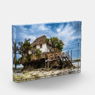 Picturesque house on a tropical coral outcrop photo block