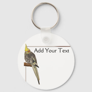 Pied Cockatiel on a Branch with White Key Ring