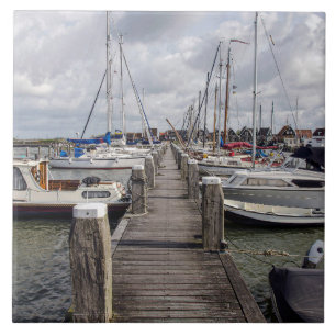Pier with boats and yachts in Marken Netherlands Ceramic Tile