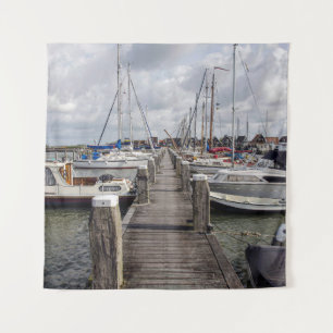 Pier with boats and yachts in Marken Netherlands Tapestry