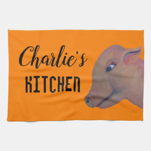 pig on orange tea towel