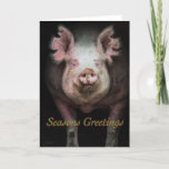 Piggy greetings holiday card<br><div class="desc">A pig walking out of a dark barn,  with "Seasons Greetings" written below its face</div>