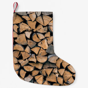 Pile of brown firewood small christmas stocking