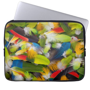 Pile of colourful feathers laptop sleeve