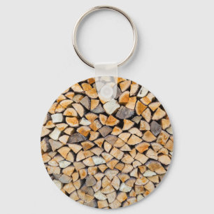 Pile of firewood as tree trunk key ring