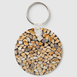 Pile of firewood as tree trunk key ring