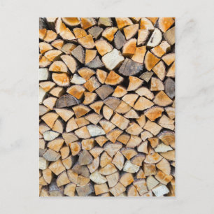 Pile of firewood as tree trunk postcard