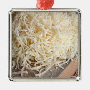 Pile of fresh mozzarella cheese. metal tree decoration