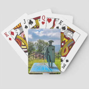 Pilgrim statue playing cards