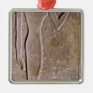 Pillar depicting a woman smelling a lotus flower metal ornament