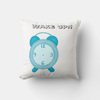 Pillow with cute blue a clock and wake up text