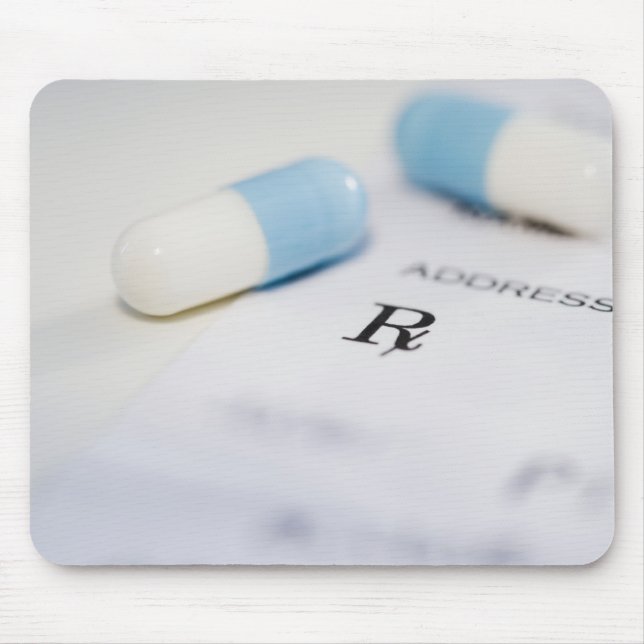 Pills on written prescription mouse pad (Front)