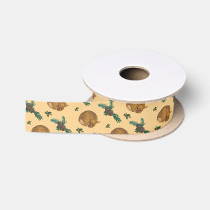 Pine branches, holly and fawn. satin ribbon