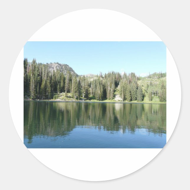 pine tree mirror on lake classic round sticker (Front)