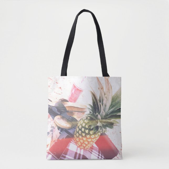 Pineapple beside phone and speaker tote bag (Front)