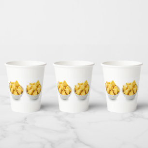 pineapple chunks in a bowl paper cups