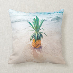 Pineapple fruit on beach shore in the morning cushion