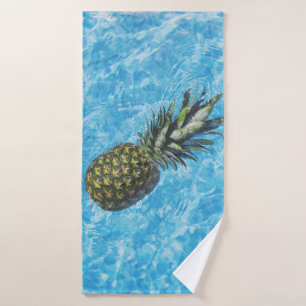 Pineapple in water bath towel