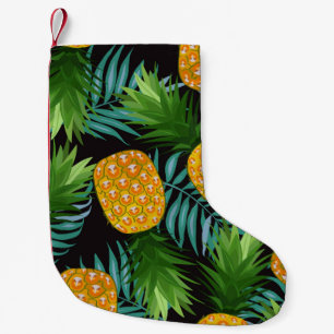 Pineapple seamless pattern with palm leaves on bla small christmas stocking