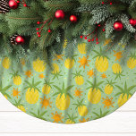 Pineapple Tropical Christmas Brushed Polyester Tree Skirt<br><div class="desc">Brighten up your holiday decor with this cheerful Pineapple Tropical Christmas tree skirt. Made from soft brushed polyester, this vibrant design features golden pineapples and sun motifs set against a festive background. Perfect for adding a touch of tropical warmth to your Christmas tree, this unique tree skirt brings a fun...</div>