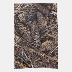 Pinecones and Pine Needles on Forest Floor Tea Towel