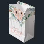Pink and Beige Watercolor Floral Bridal Shower Medium Gift Bag<br><div class="desc">A beautifully feminine bridal shower gift bag design featuring a bouquet of watercolor poppies,  roses,  eucalyptus and trailing greenery in pastel beige,  pink,  green and blue-green. A trendy script font spells out the word "Bridal" prominently in matching pink. Personalise the text template with the bride-to-be's name.</div>