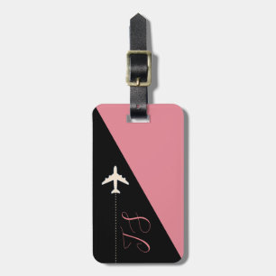 pink and black aeroplane travel luggage tag