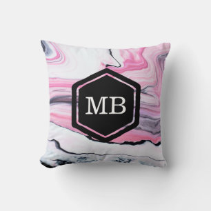 Pink and black marble patterned monogram pillow