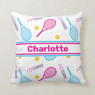 Pink and blue tennis rackets with custom name cushion