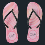 Pink and Gold Swirl Marble Monogrammed Thongs<br><div class="desc">Pink and gold swirl marble pattern monogrammed flip flops. Great for bridal parties,  beach weddings,  the beach,  the pool,  and any where in the warmer months!</div>