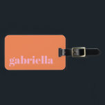 Pink and Orange Bold Typography Personalised Name  Luggage Tag<br><div class="desc">Travel in style with this personalised luggage tag featuring a modern minimalist design. The pink elegant serif name stands out against a soft orange background, creating a chic and timeless look. Perfect for frequent travelers, business professionals, students, and vacationers who want to easily identify their bags. The back includes space...</div>