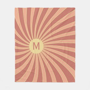 Pink and orange retro style sunburst design fleece blanket